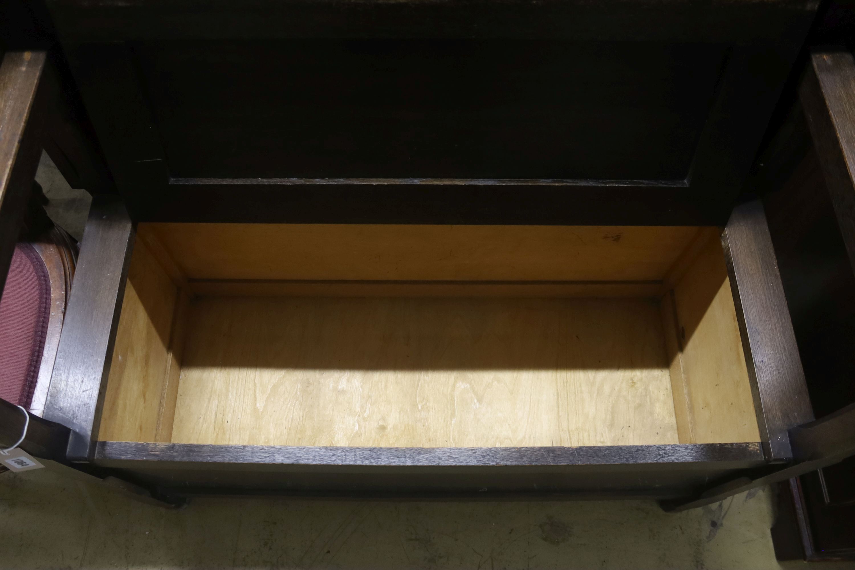An 18th century style oak monk's bench, width 107cm, depth 54cm, height 99cm